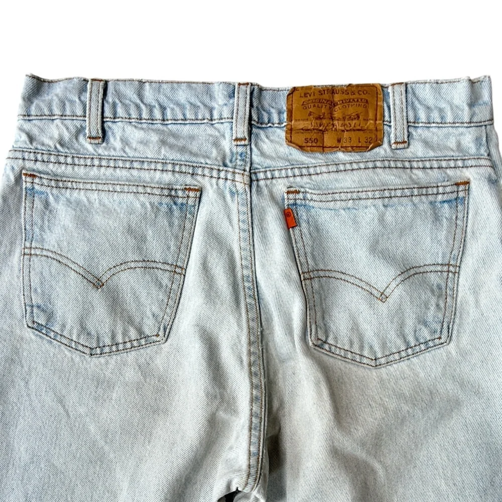 Vintage Orange Tab Levi’s 550 Light Wash Relaxed Baggy Jeans Made in USA, 33